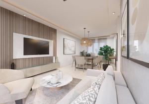 TV a/nebo společenská místnost v ubytování Los Castillos Resort