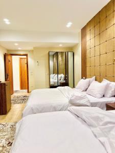 Lodge Pyramids View Hotel客房内的一张或多张床位