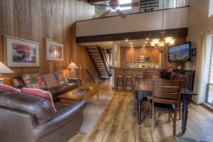 a living room with a couch and a table at Kingswood Cornerview home in Kings Beach