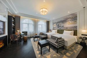 a hotel room with a bed and a fireplace at Chongqing Manque Mansion, Century Old Republic Style & River View, Free Custom Photoshoot, Free Breakfast & 131 Skydeck Ticket in Chongqing