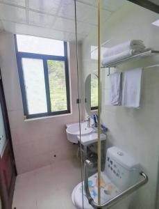 Vannituba majutusasutuses Junyao Inn