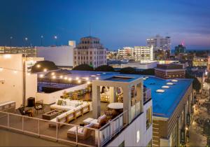 a view of a building with a pool on top of it at Sea & Sky 2 Bed Escape Apt in Santa Monica with FREE PARKING in Los Angeles