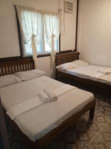 Gallery image of NATUA'S BEACH RESORT in Liminangcong +20 photos