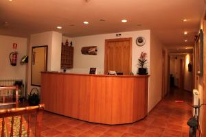 Lobby o reception area sa Hostal La Granja