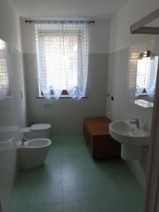 Koupelna v ubytování La Corte B&B + 22 fotografií