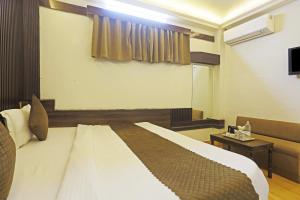 Postel nebo postele na pokoji v ubytování HILIFE Inn