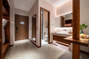 Kuchyň nebo kuchyňský kout v ubytování Chengdu Guiyuan Hotel + 37 fotografií