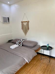 Postel nebo postele na pokoji v ubytování Moalboal Panagsama beach TopBudz Hostel