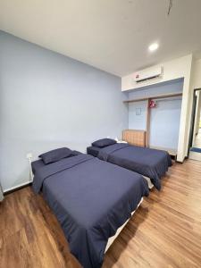 Postel nebo postele na pokoji v ubytování RTS - L7 L8 ROXY Townhouse Sematan