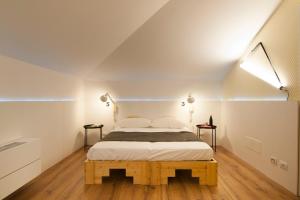 Postel nebo postele na pokoji v ubytování Gabanel Bike Hostel
