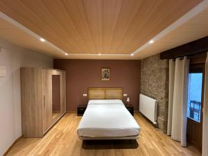 Posteľ alebo postele v izbe v ubytovaní Hostal Rural 18 de Abril