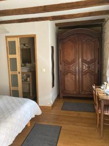 Postel nebo postele na pokoji v ubytování Moulin Lou Apmay