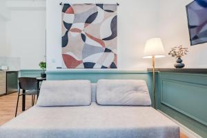 Postel nebo postele na pokoji v ubytování Prenzlauer Pearl Luxury Suite + 14 fotografií