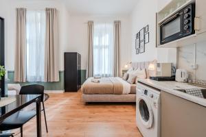 Kuchyň nebo kuchyňský kout v ubytování Prenzlauer Pearl Luxury Suite