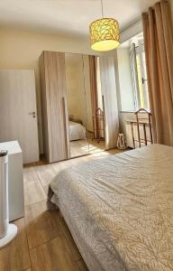 Postel nebo postele na pokoji v ubytování Appartamento Granella + 9 fotografií