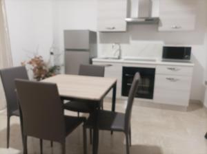 Kuchyň nebo kuchyňský kout v ubytování L'Ulivo