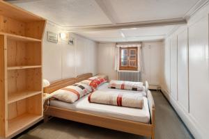 Ліжко або ліжка в номері Apartment Via Alpsu - 24-7 Self Check-in