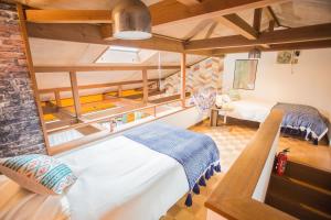a bedroom with two beds in a room at Hill Atagawa Villent in Higashiizu