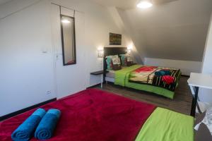 Postel nebo postele na pokoji v ubytování LES AGAPANTHES du 27 -ème + 37 fotografií