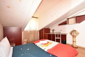 Postel nebo postele na pokoji v ubytování Rooms in the heart of Yerevan 3 + 5 fotografií
