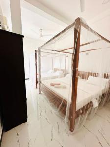 Postel nebo postele na pokoji v ubytování Garden Beach Hotel