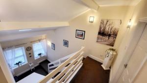 a staircase in a home with a stair case at 2 hicks lane, apartment 2 in Whitehaven