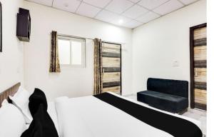 Postel nebo postele na pokoji v ubytování Hotel O Kashish Residency