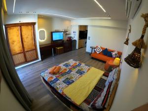 TV a/nebo společenská místnost v ubytování Deluxe Apartment Delta Sharm