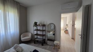 a bedroom with a room with a bed and a room with at Lake Como House in Como