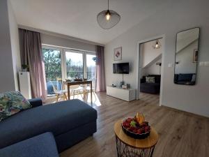 Μια τηλεόραση ή/και κέντρο ψυχαγωγίας στο MR HOME APARTMENTS - Limba +63 φωτογραφίες