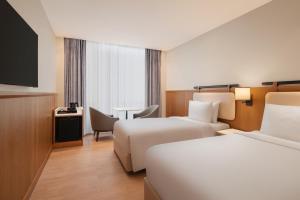 Postel nebo postele na pokoji v ubytování Fairfield by Marriott Amritsar