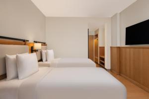 Postel nebo postele na pokoji v ubytování Fairfield by Marriott Amritsar
