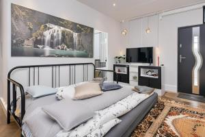 Ένα ή περισσότερα κρεβάτια σε δωμάτιο στο Cutie apartment