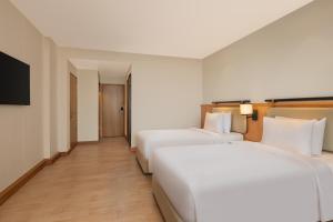 Postel nebo postele na pokoji v ubytování Fairfield by Marriott Amritsar