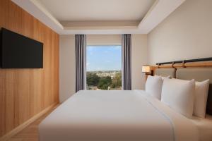 Postel nebo postele na pokoji v ubytování Fairfield by Marriott Amritsar