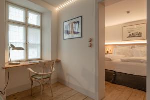 Posteľ alebo postele v izbe v ubytovaní Steinach Townhouse Meran