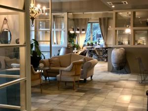 Posezení v ubytování Hotel Le Corderie