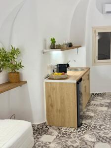 Kuchyň nebo kuchyňský kout v ubytování The Nest Apartments