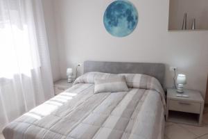 Postel nebo postele na pokoji v ubytování B&B Sibi