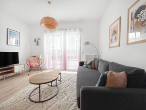 Ruang duduk di Appartement Cosy Avec Grande Terrasse