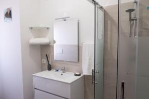Koupelna v ubytování B&B Sibi