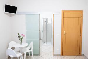 TV a/nebo společenská místnost v ubytování B&B Sibi