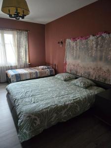 Postel nebo postele na pokoji v ubytování Le Goutanou