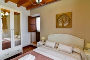 Posteľ alebo postele v izbe v ubytovaní Cómoda casa en entorno natural y cerca de la playa