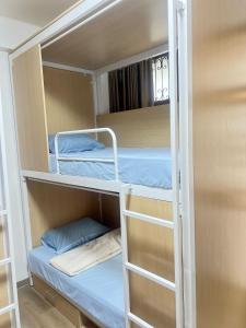 Vuode tai vuoteita majoituspaikassa JC home 刘 先 生