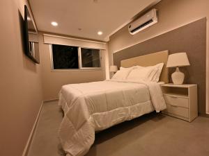 Llit o llits en una habitació de ABIBA Apart-Hotel & SPA