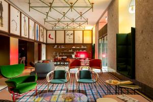 A seating area at Room Mate Collection Giulia, Milan