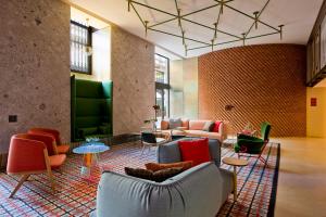 A seating area at Room Mate Collection Giulia, Milan