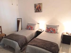 Ένα ή περισσότερα κρεβάτια σε δωμάτιο στο Casa Palomar +35 φωτογραφίες