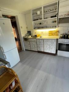 Kuchyň nebo kuchyňský kout v ubytování MOJITO`s ROOM + 29 fotografií